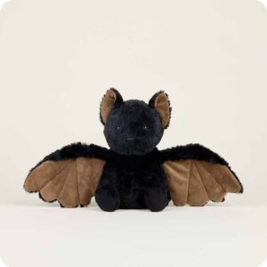 black bat stuffie with wings outstretched, brown fur inside wings and ears
