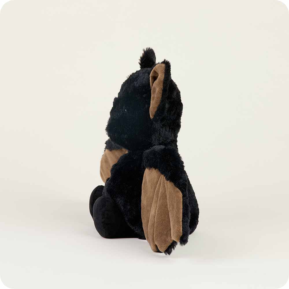 side view with brown fur on inside of wing