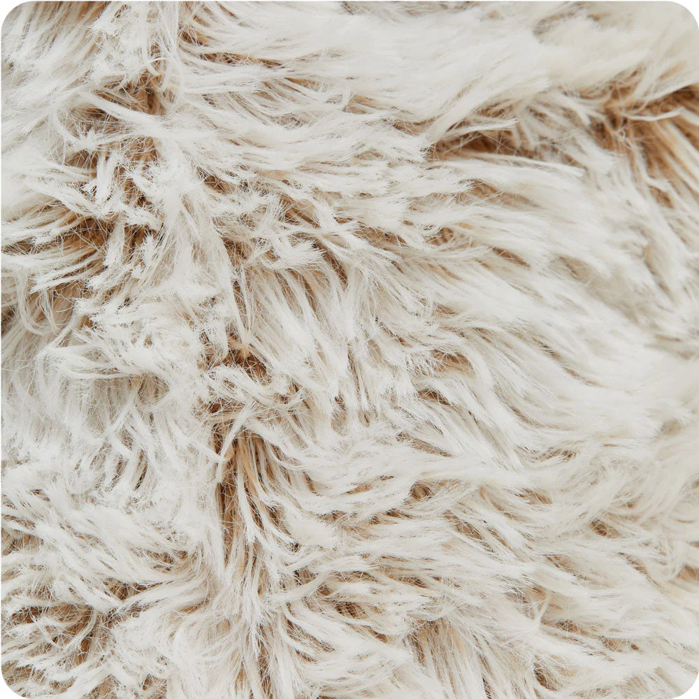 shows long cream fur with some beige