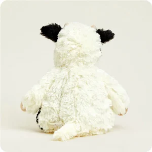 back of cow, white body and black ears