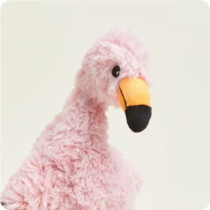 close up of flamingo face with orange beak tipped in black and embroidered eyes