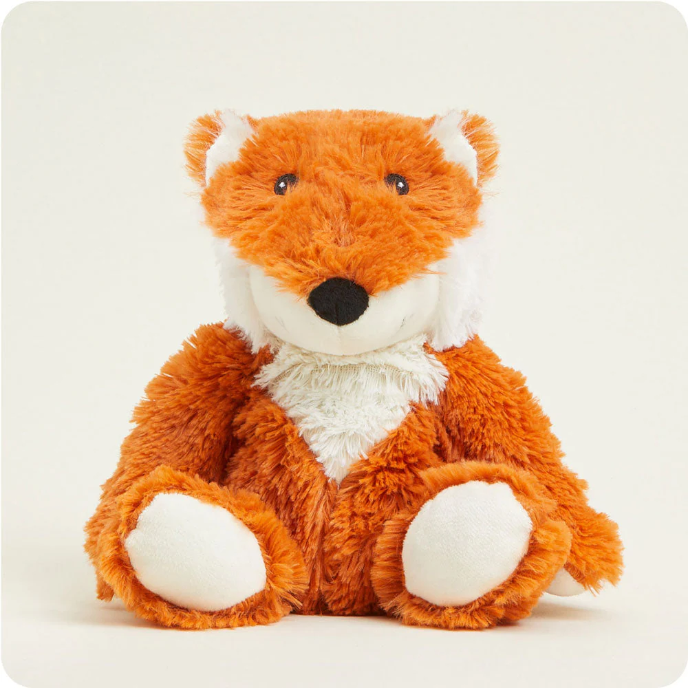 seated fox stuffie with bright reddish orange fur with cream spots around face, neck, and bottoms of feet