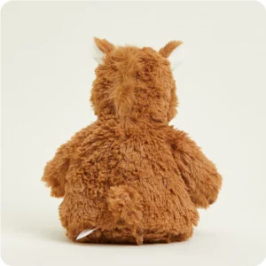 back view shows longer tufts of fur for mane and short tail