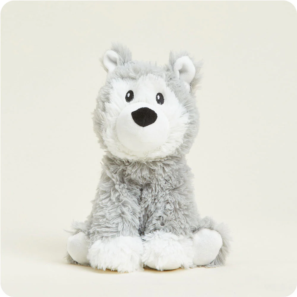 grey husky stuffie with grey long fur and white face and paws