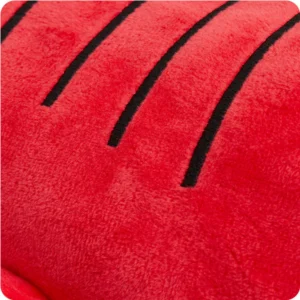 closeup of short red fur and embroidered black lines across back