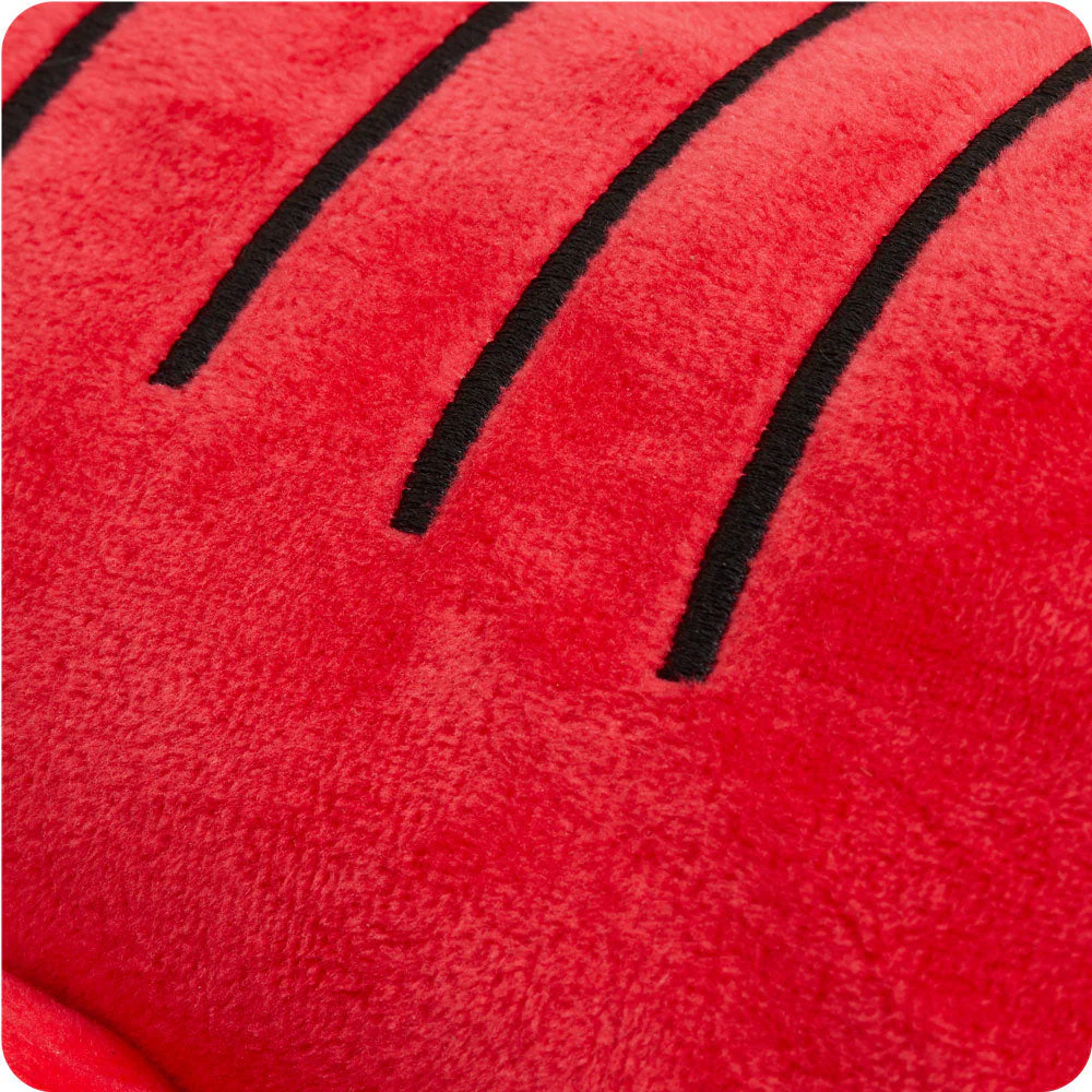 closeup of short red fur and embroidered black lines across back