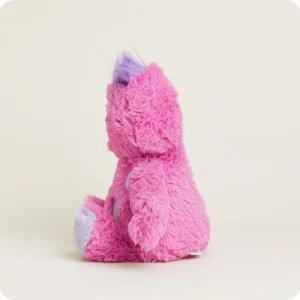 side view of pink body, purple tuft of hair at top of head