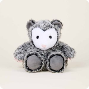 seated opossum stuffie with grey fur and white face