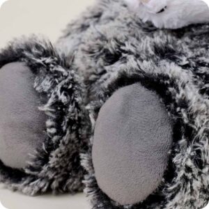 close up of long fur is dark grey with lighter grey at tips, short grey fur on bottom of feet
