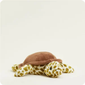 turtle stuffie with cream fur with dark olive green spots and solid brown shell