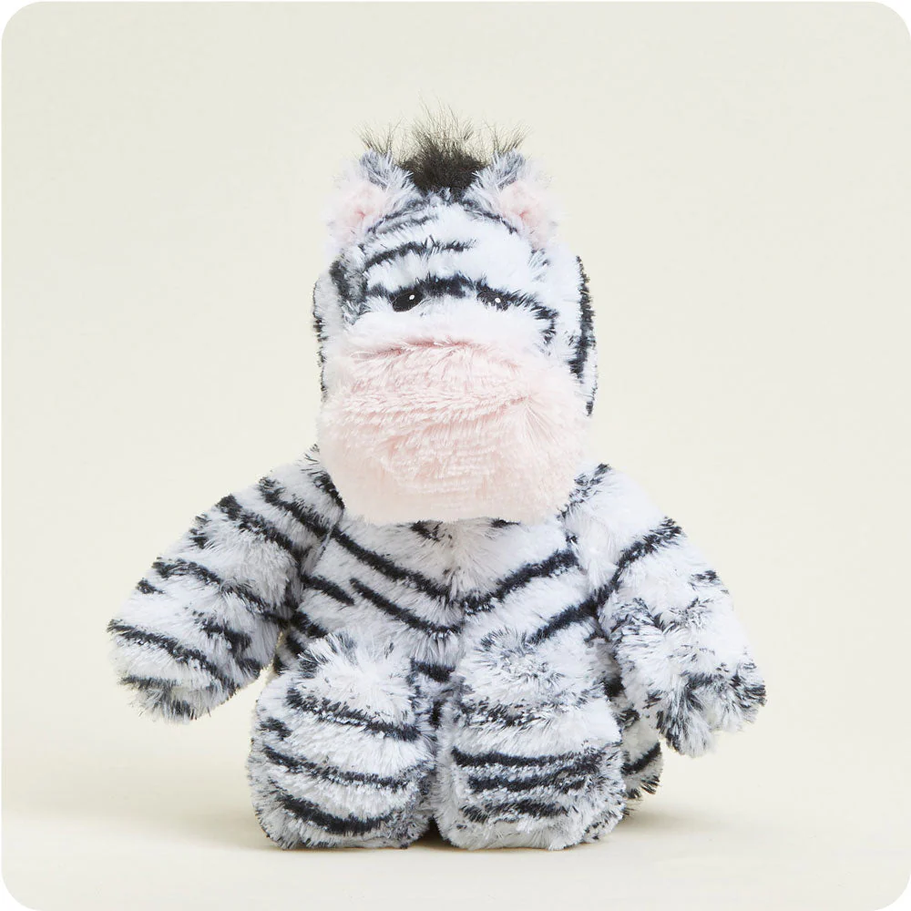 White zebra stuffie with thin black stripes and pink nose