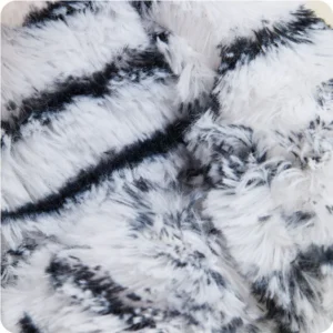 closeup of mid length fur, mainly black with thin black stripe