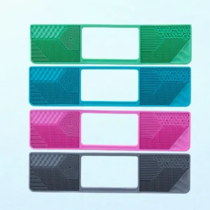 4 colors of laptop gidgets, green, blue, pink and grey
