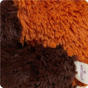 close up of mid length fur in burnt orange and dark brown