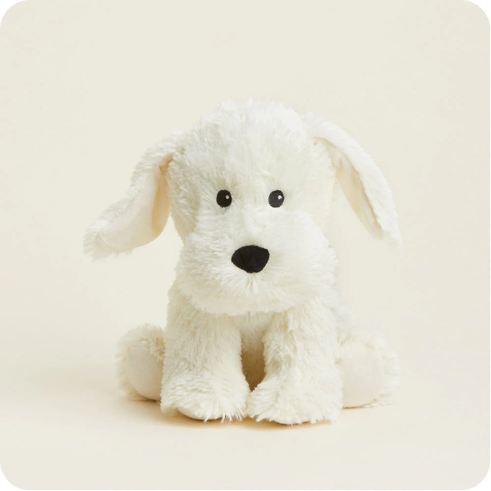 cream colored dog stuffie with black eyes and nose and long ears