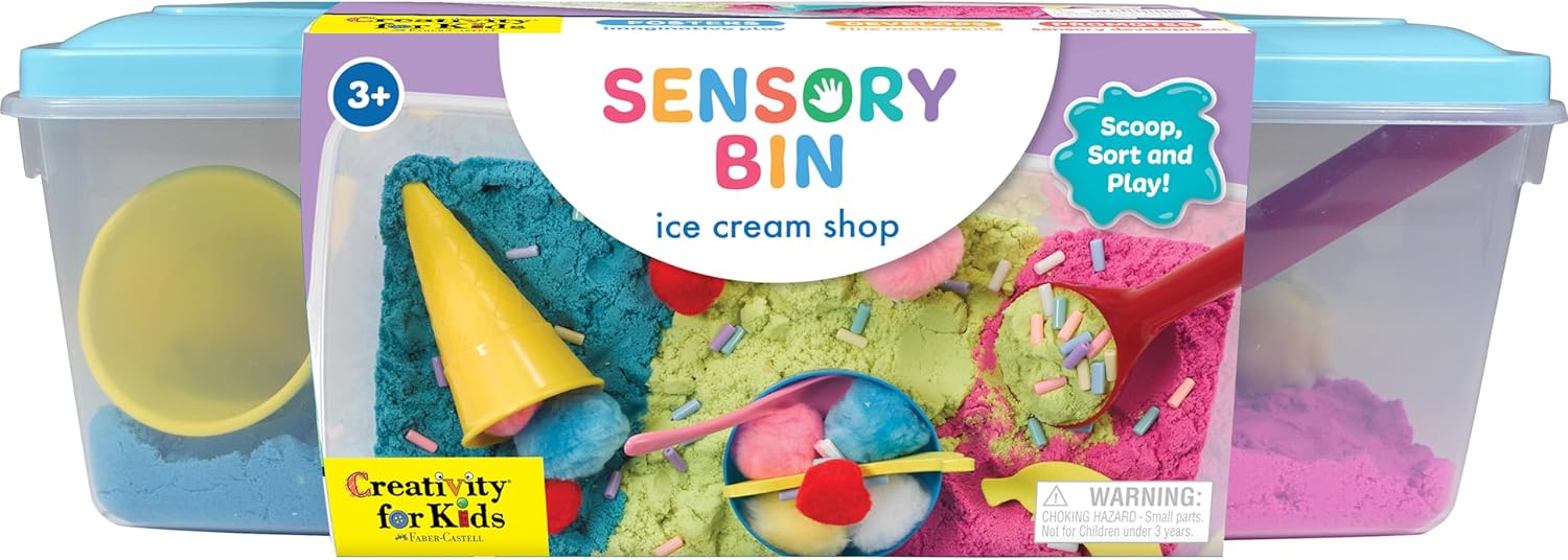 plastic bin with lid with all sensory items inside with sand