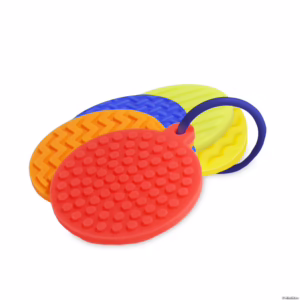 key ring with 5 circular textured mats