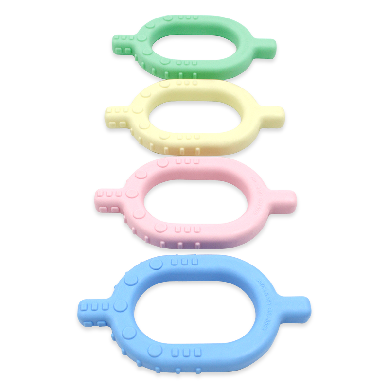 4 pastel colored chews, oval shaped