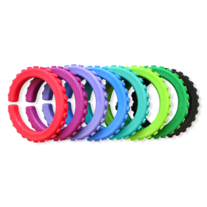 multiple chew bracelets with texture around the outside edge