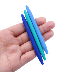 3 blue chewth picks in the palm of a hand