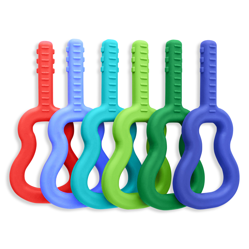 several guitar shaped chews in various colors