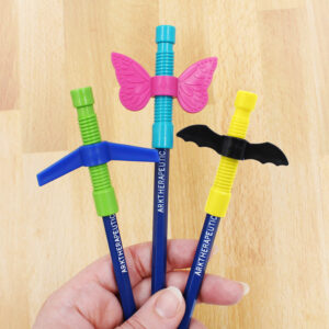 3 pencil toppers on pencils