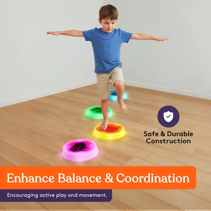 enhance balance and coordination - boy is stepping on a stone with arms out for balance