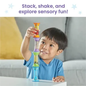 can shake and stack the sensory tubes, small boy has made 4 into a tower
