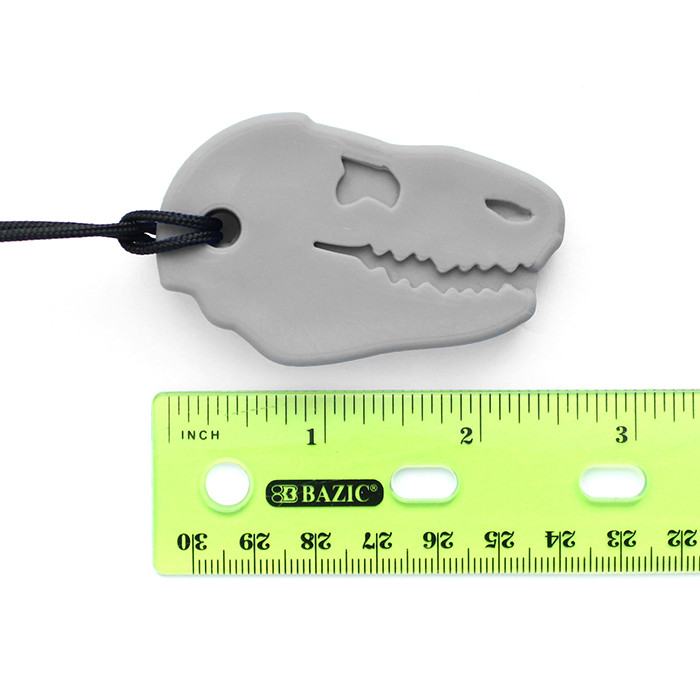grey t rex head skull shaped pendant with black cord and ruler- is about 2.5" long