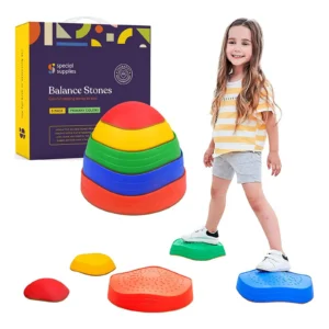 balance stones in red, yellow, green and blue that stack into a dome shape