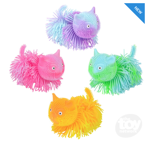 shaggy cat shaped toy in blue/purple, green, yellow and pink