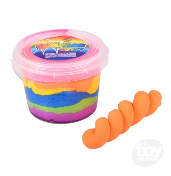 bucket of putty in different colors with orange putty twisted into a twist