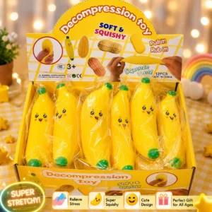 Box of yellow banana squishy toys with smiley faces