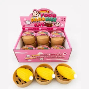 display box with steamer cups with corn cob squishy toys inside