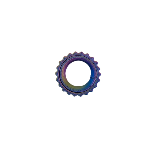 dark purple irridescent ring with small bumps along the outside