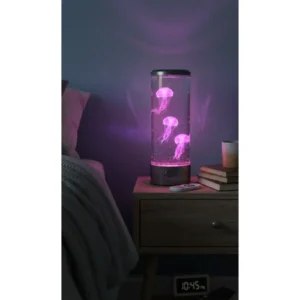 black plastic base and top with water with 3 pink fake jellyfish floating inside, lit up in a dark room