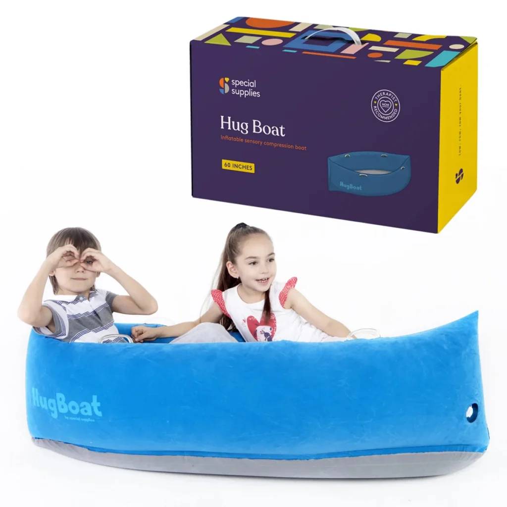 two children in a blue hugboat pretending to look through binoculars, with the product box