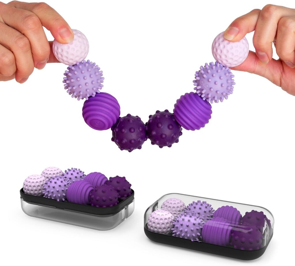 a chain of 8 silicone-covered magnetic sensory balls in light purple, lilac, mid-purple and dark purple