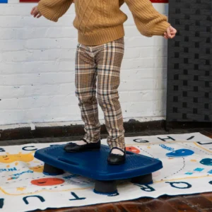 girl standing on the board in a room