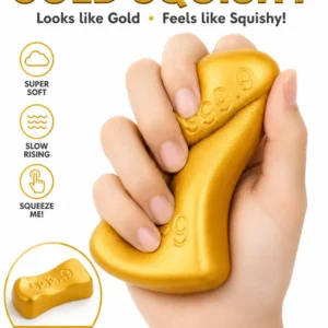hand squishing a golden bar toy with an inset showing 999.9 embossed on the top