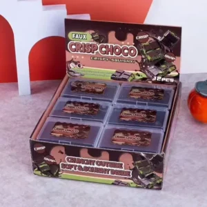 display case shows fake chocolate bars in a clear plastic case