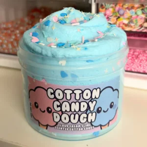 jar of cotton candy slime that is light blue with multicolored sprinkles in different shapes
