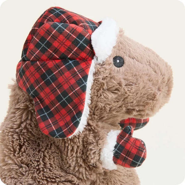 side view close up of brown capybara with small plaid mittens and ear flap hat with white trim