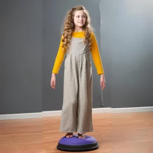 child balancing on dome with flat side down