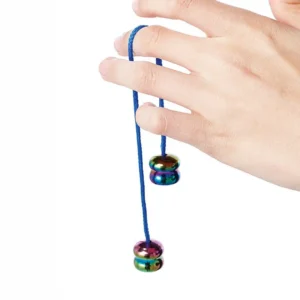 a hand with a string looped around a finger with iridescent weighted beads at the ends