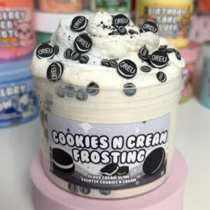 plastic container of white slime with black cookie crumbs and black and white cookie sprinkles that say "oreu"