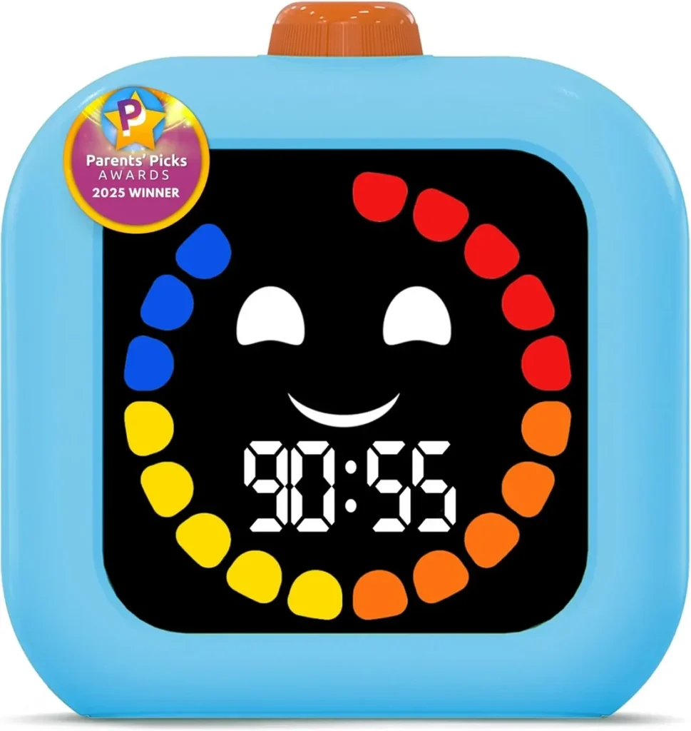 blue square-shaped timer with orange knob on top, a white smiley face with digital time, and multicolored dots around the face in a circle
