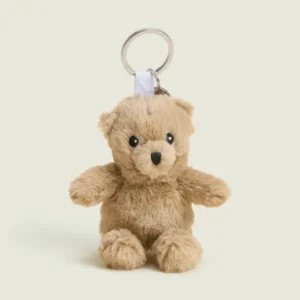 tan teddy bear on a keychain