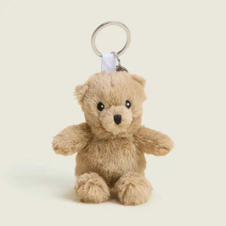 tan teddy bear on a keychain