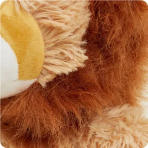 close up shows short cream and gold fur, long tan textured fur, and long reddish brown fur